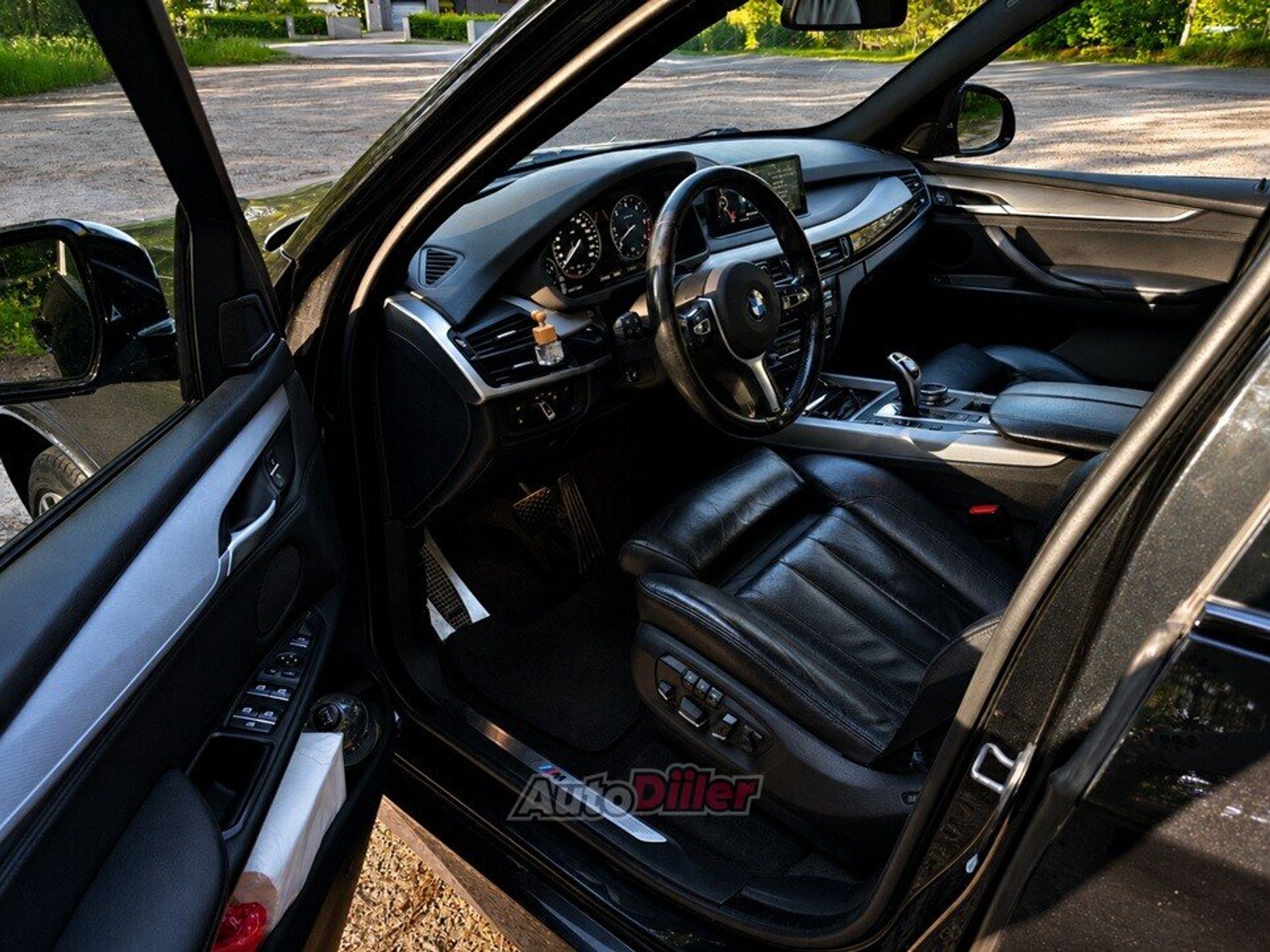 BMW X5 M-Pakett 7 kohta 3.0 190kW 2014, photo 7/9