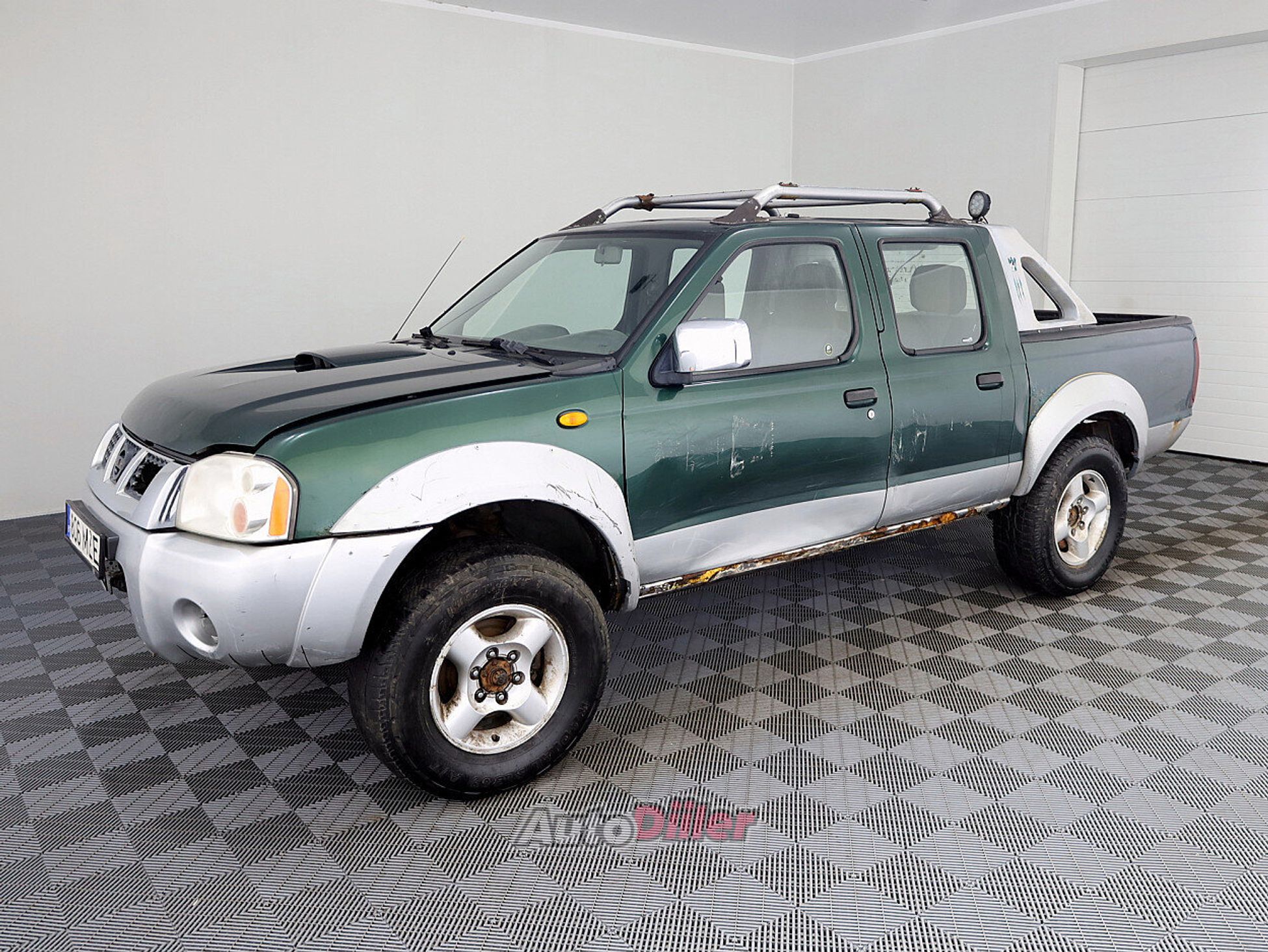 Nissan Navara 2.5 98kW 2004, photo 2/7